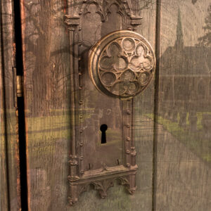 Photo overlapped images. An antique door knob and a graveyard. Clickable link to photo editing gallery.